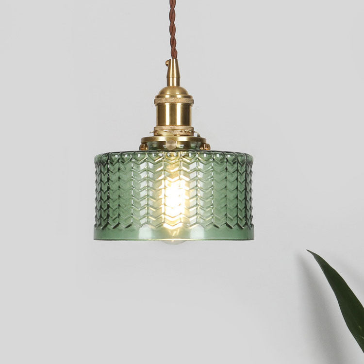 Round patterned glass pendant light with brass fitting and twisted cord