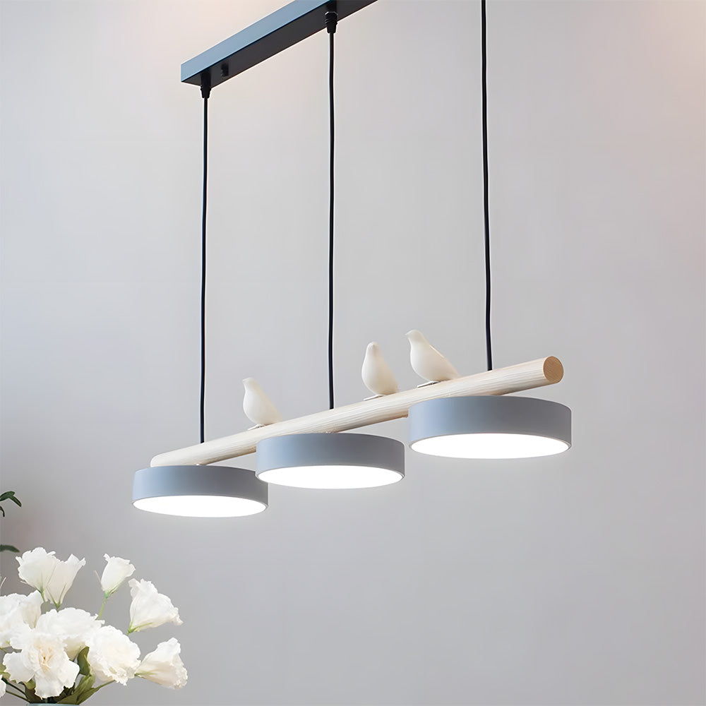 Three-shade LED pendant light with wood-effect bar and decorative bird figures
