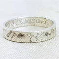 Silver-tone ring with engraved wildflower and botanical designs