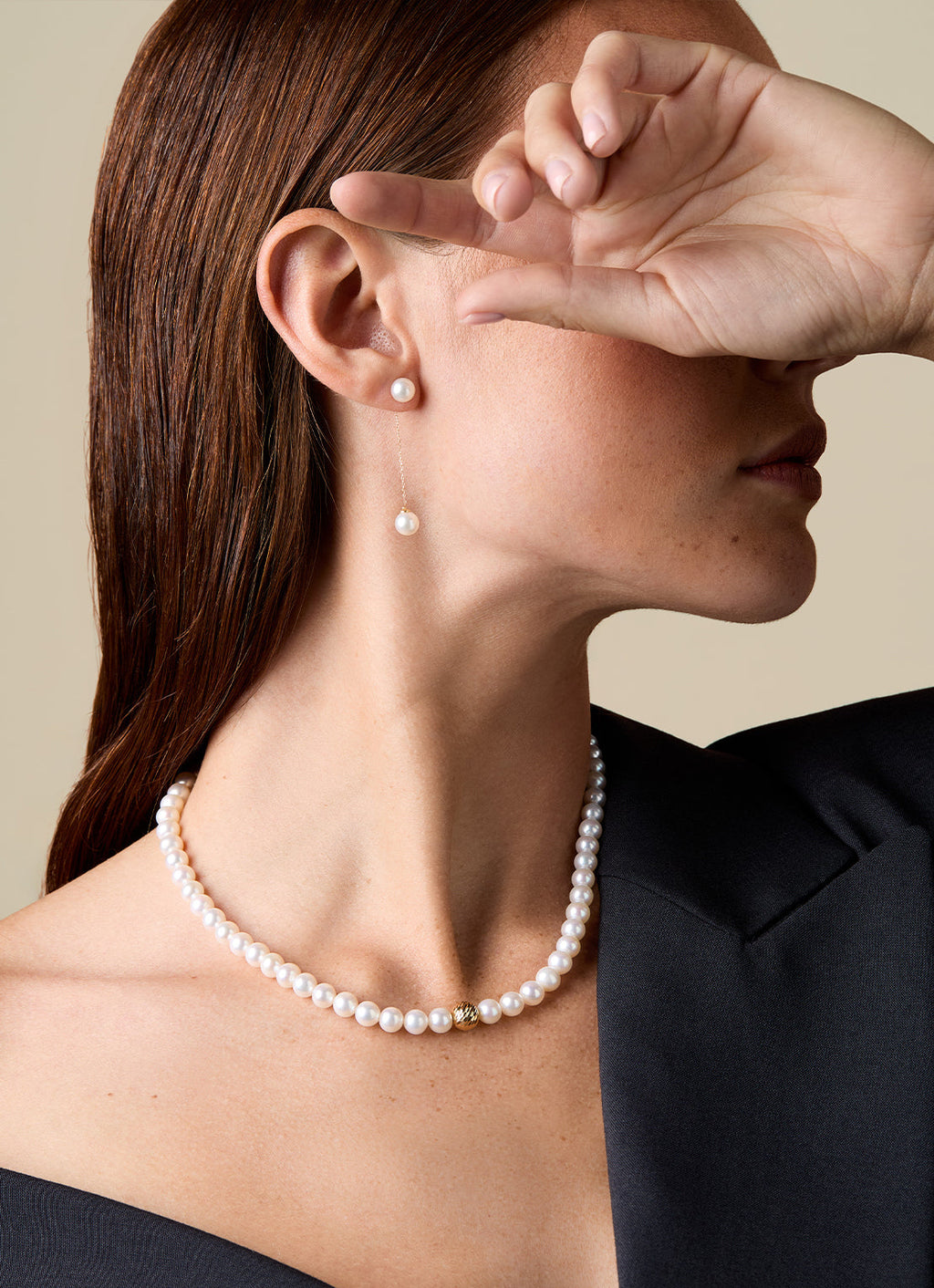Gold chain earring pendant with a round white pearl drop
