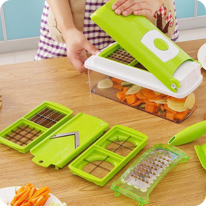 Green 12-in-1 vegetable slicer with cutting inserts and clear collection container