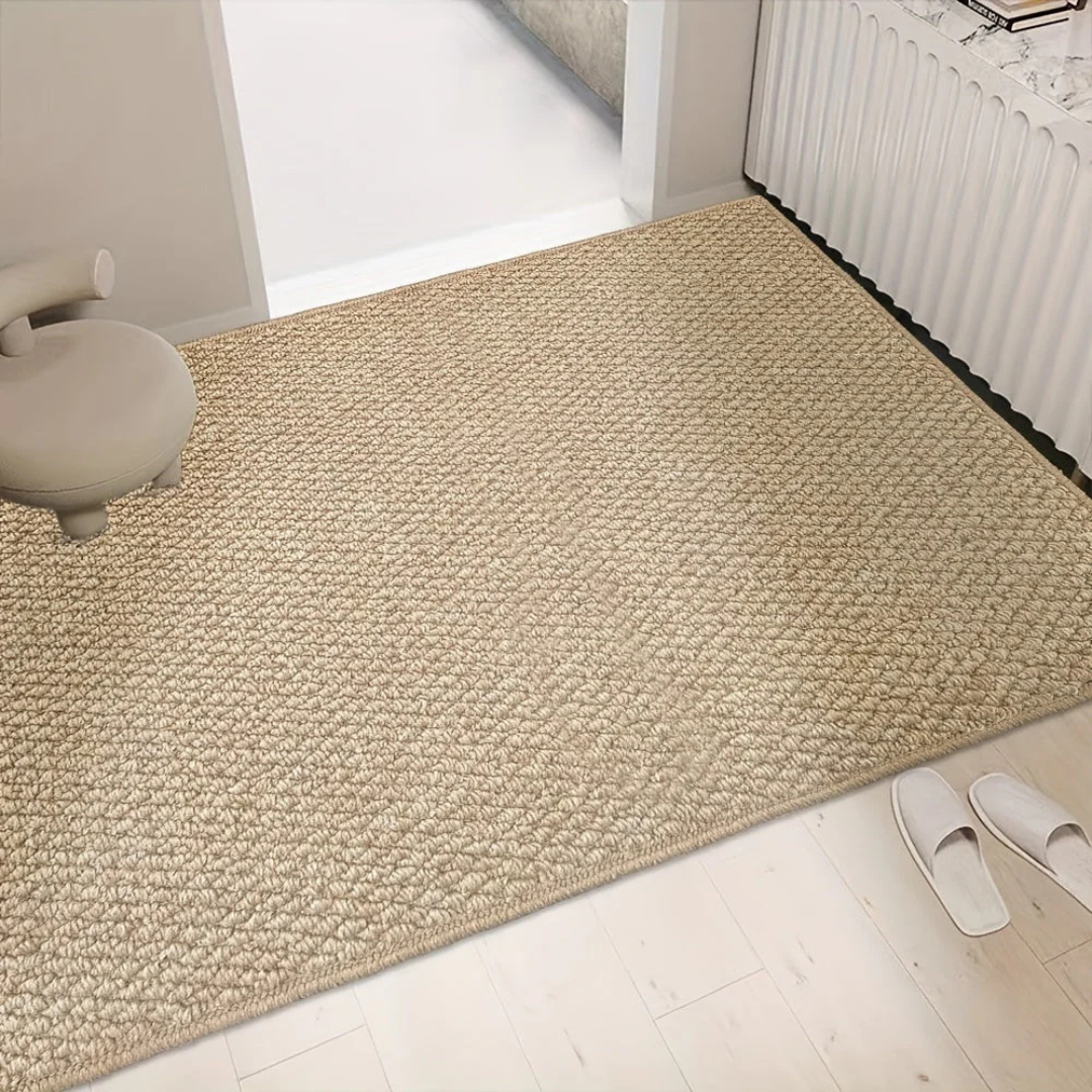 Beige rectangular textured indoor door mat with dark finished edge