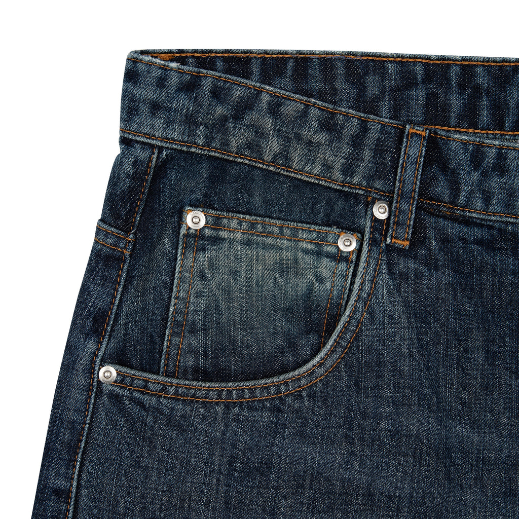 Indigo blue straight leg jeans with floral and Japanese-inspired back embroidery