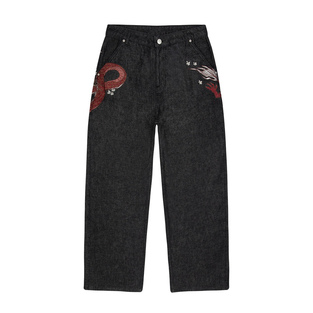 Black raw denim jeans with red and white dragon graphics