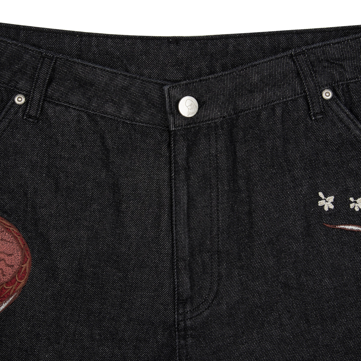 Black raw denim jeans with red and white dragon graphics