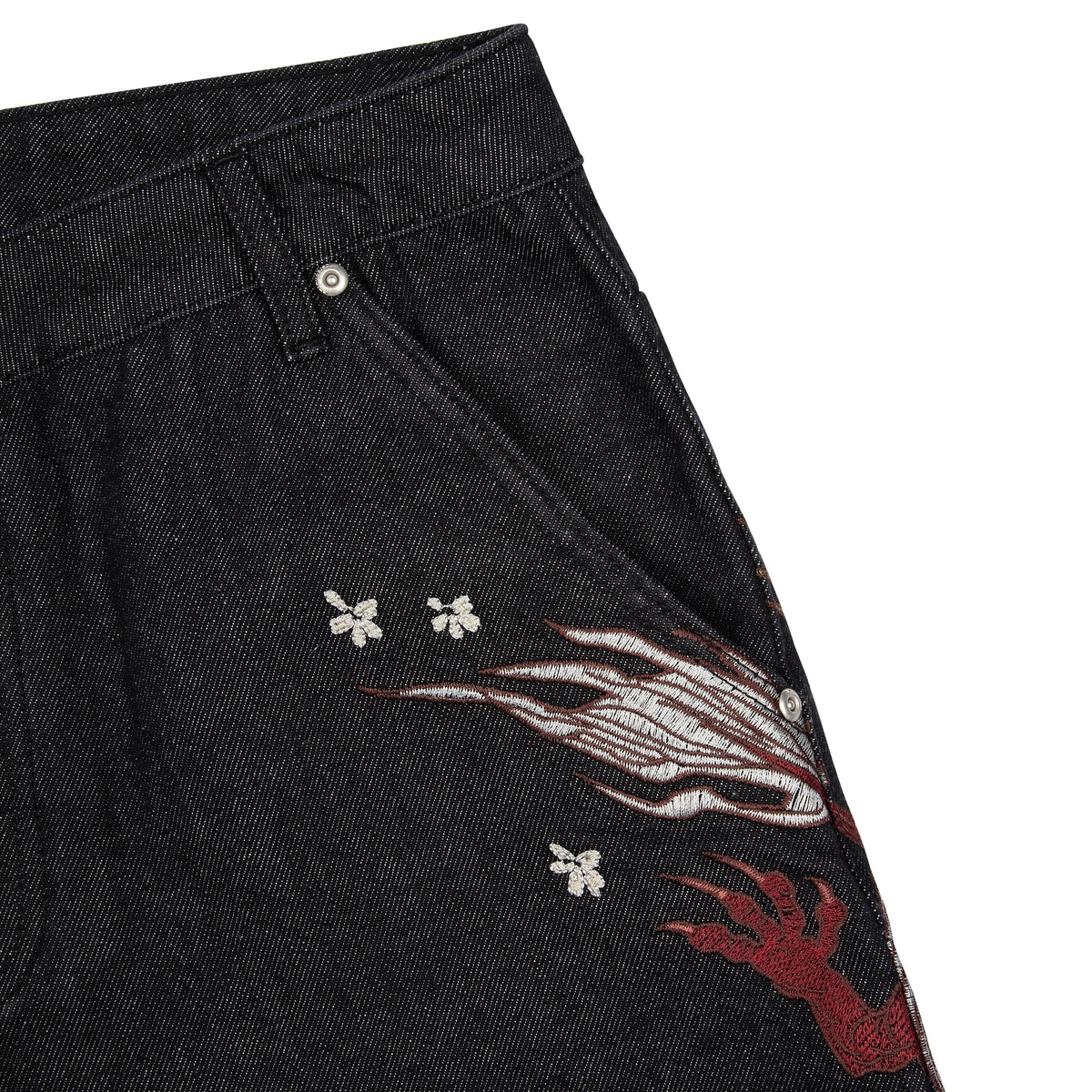 Black raw denim jeans with red and white dragon graphics