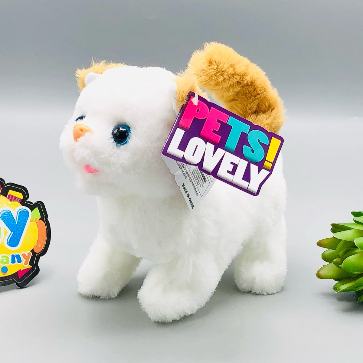 Walking plush cat toy with sound in white and orange striped designs