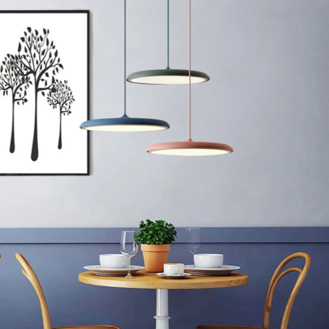 Scandinavian pendant ceiling light with a slim disc shade and suspended cord