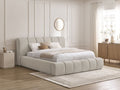 Upholstered storage bed with padded headboard and matching rounded footboard