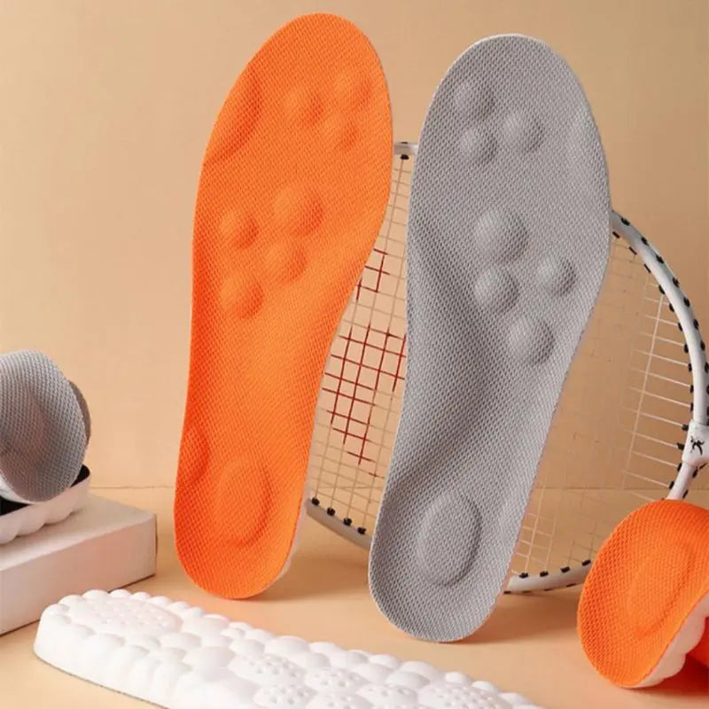 Textured comfort insoles with raised nodes and perforated sections