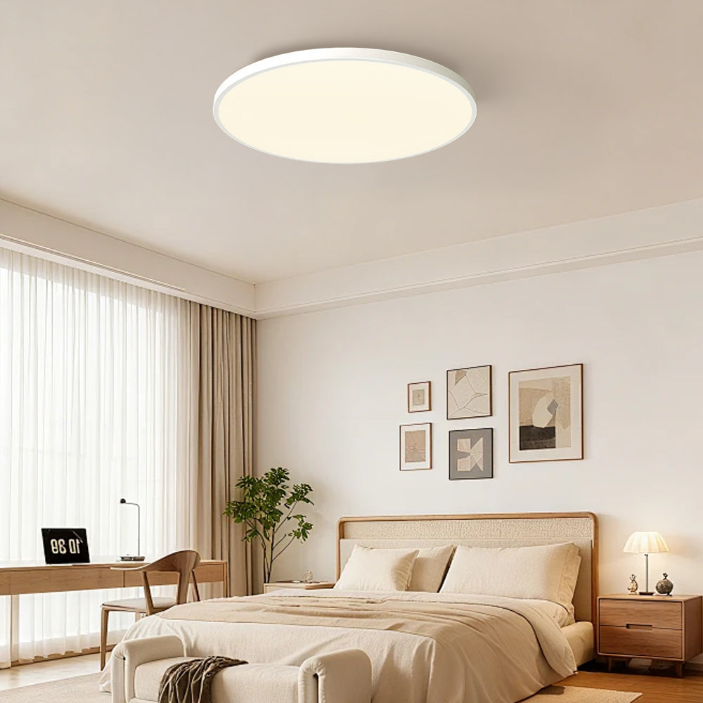 Round flush-mount LED ceiling light with a smooth circular diffuser