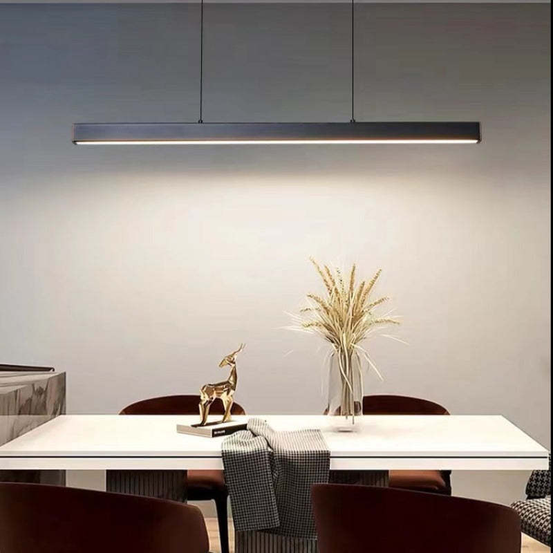 Linear LED pendant light with slim metal bar and suspension wires