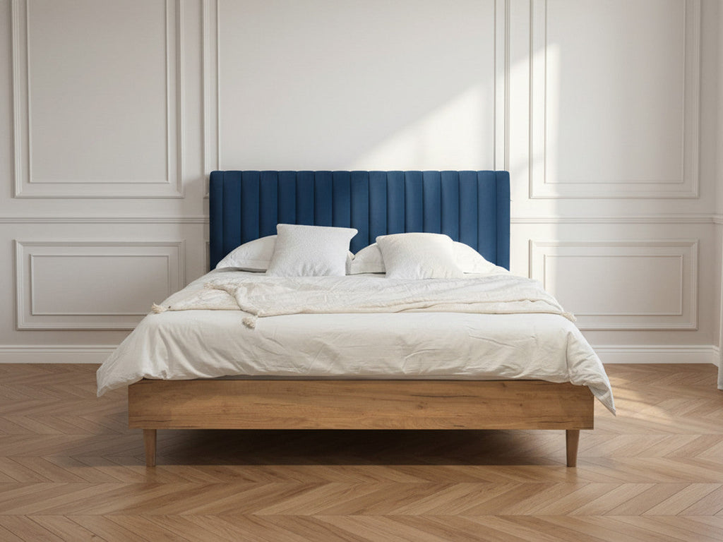 Upholstered bed frame with vertically channelled headboard