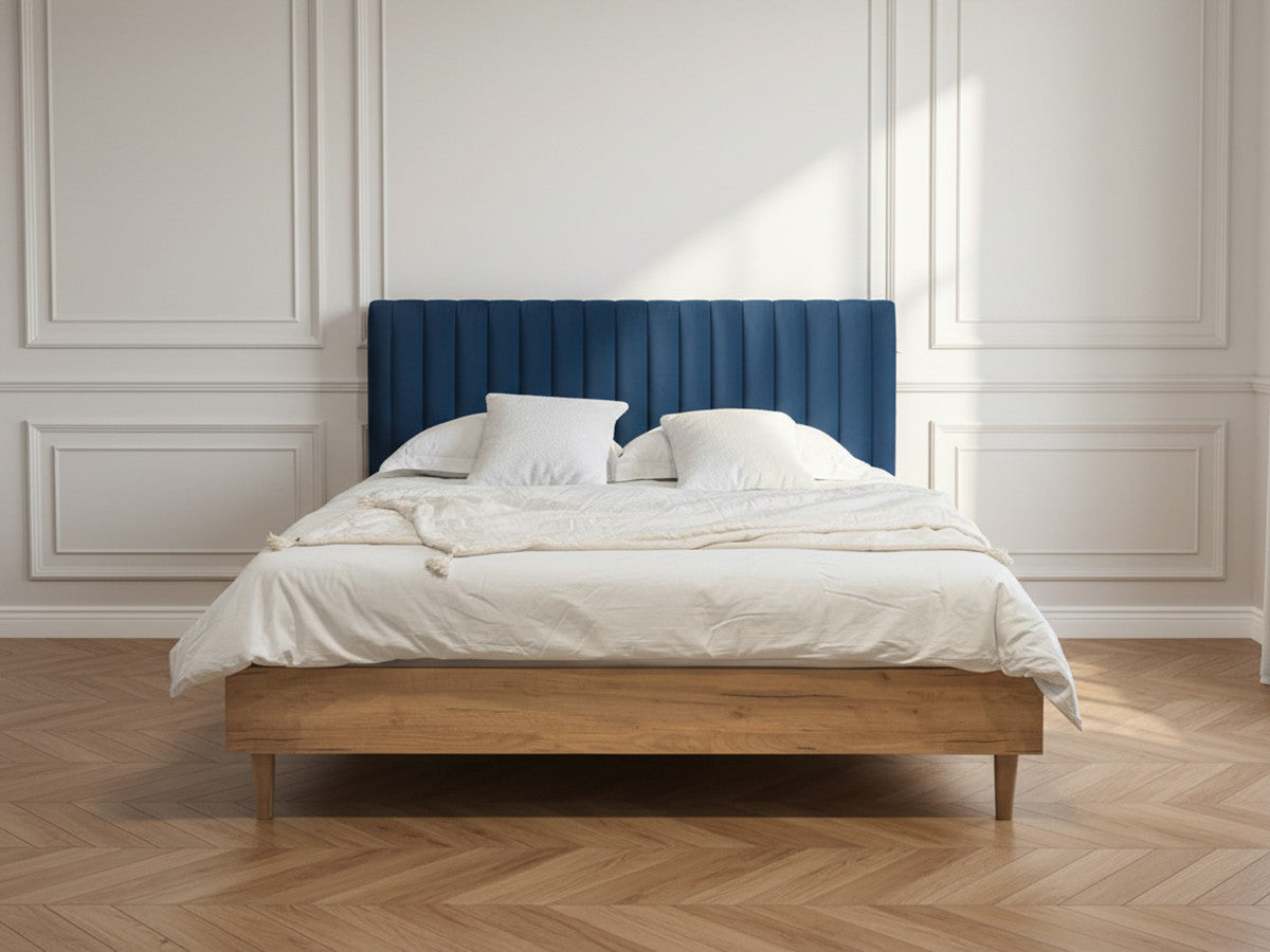 Upholstered bed frame with vertically channelled headboard