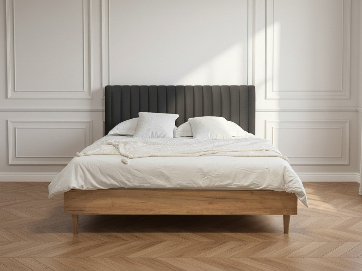 Upholstered bed frame with vertically channelled headboard