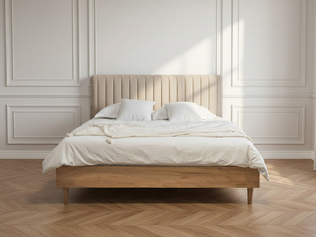 Upholstered bed frame with vertically channelled headboard