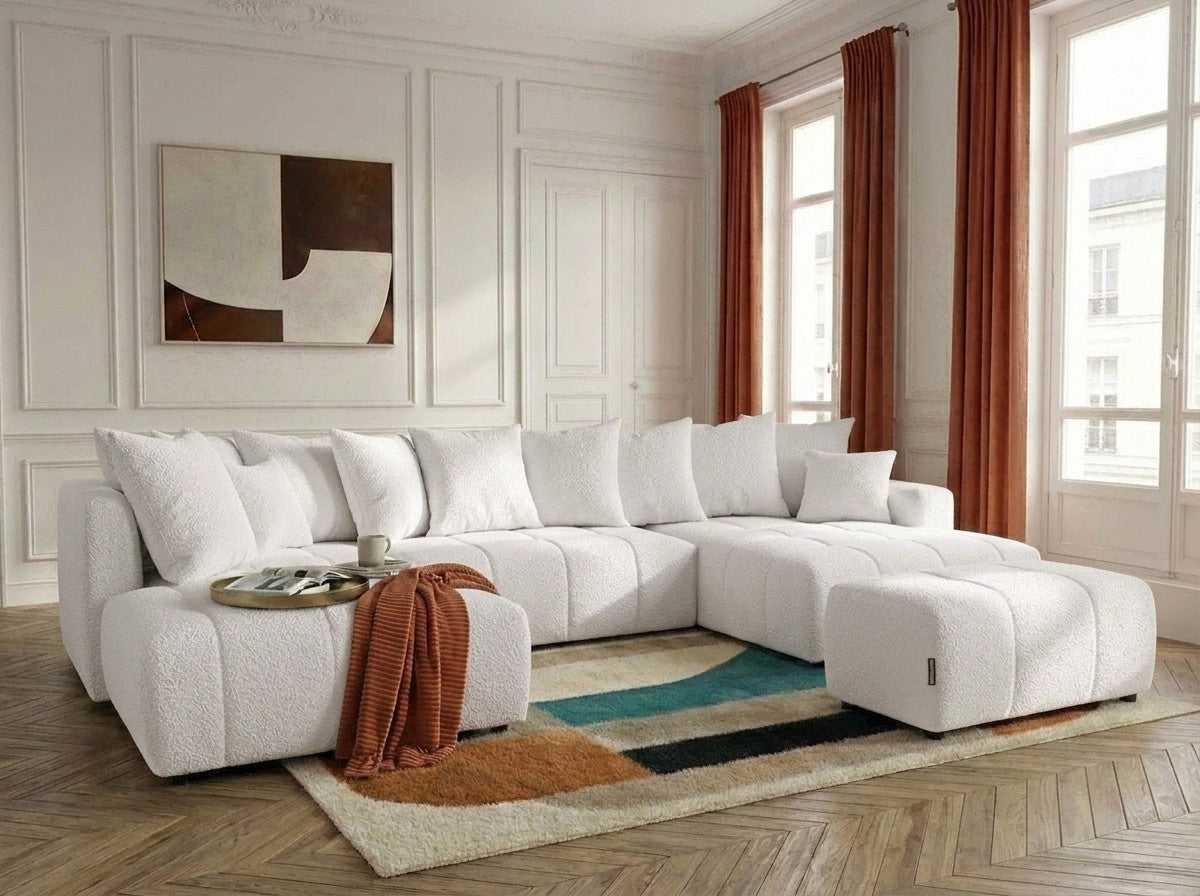 Panoramic sectional sofa bed with textured upholstery and matching pouf