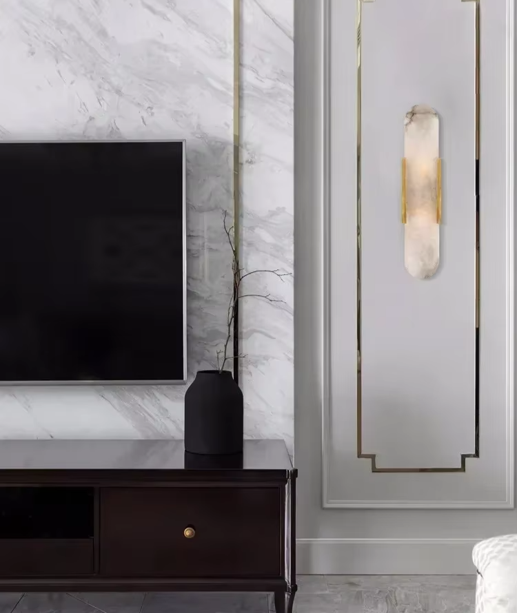 Vertical LED wall sconce with a light marble panel and contrasting side rails