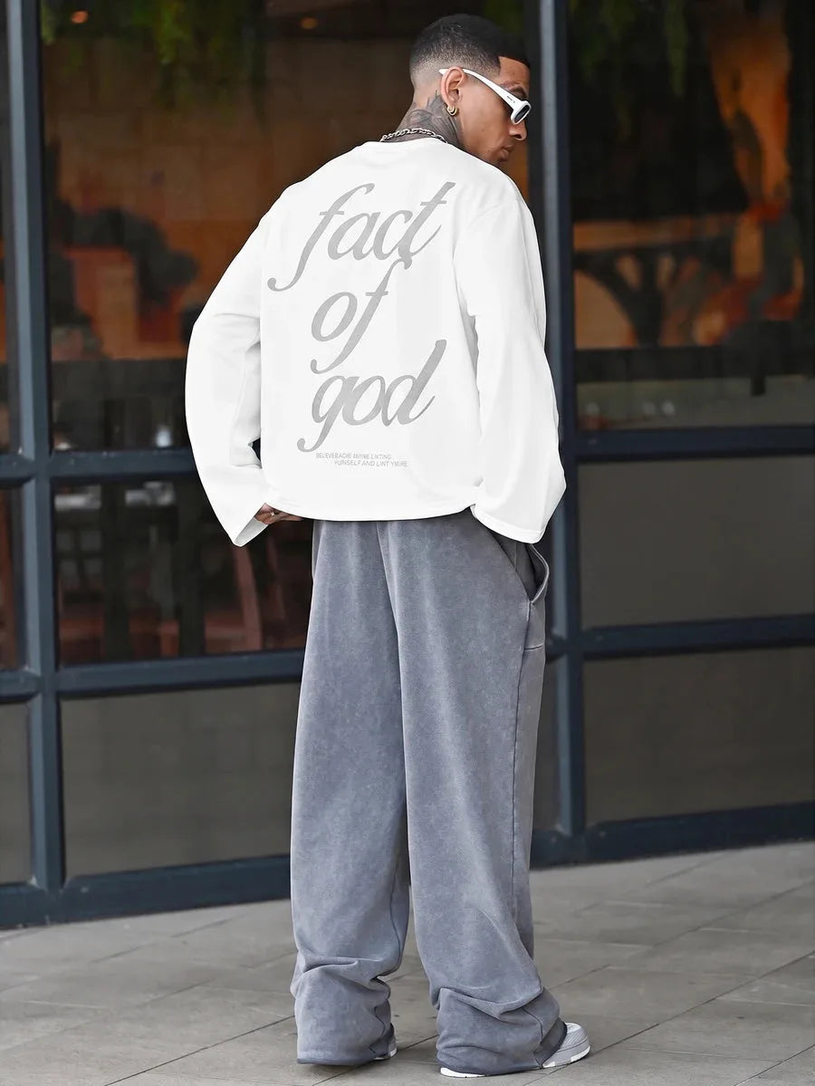 Oversized long sleeve shirt with graphic slogan design