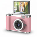 Compact digital camera with flip screen, front lens and built-in flash