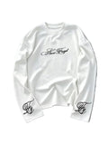 Long sleeve crew neck top with script chest and cuff prints