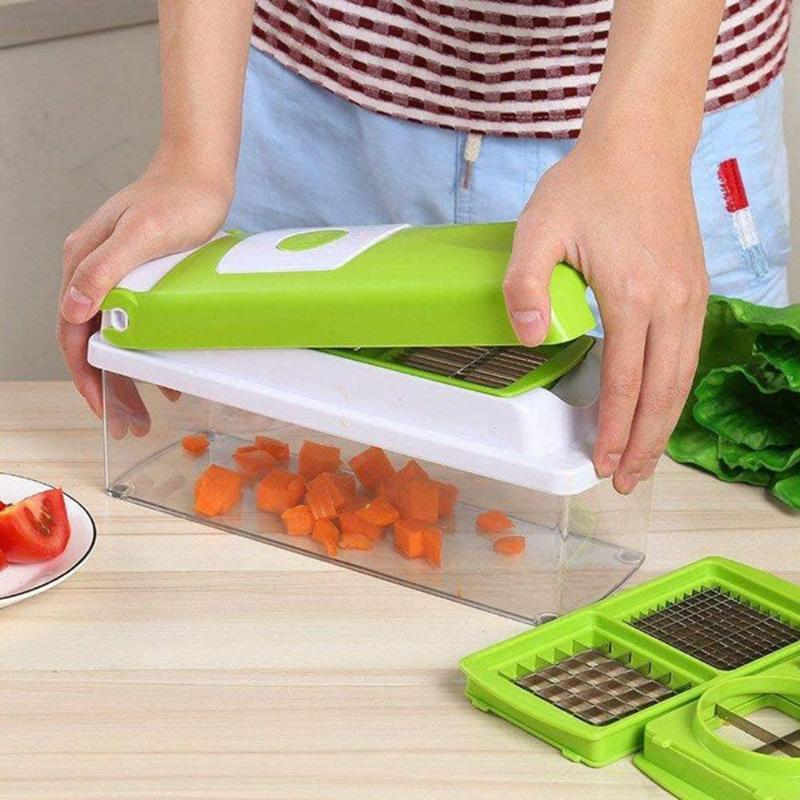 Green 12-in-1 vegetable slicer with cutting inserts and clear collection container
