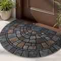 Half-circle gray geometric mosaic door mat at an entryway
