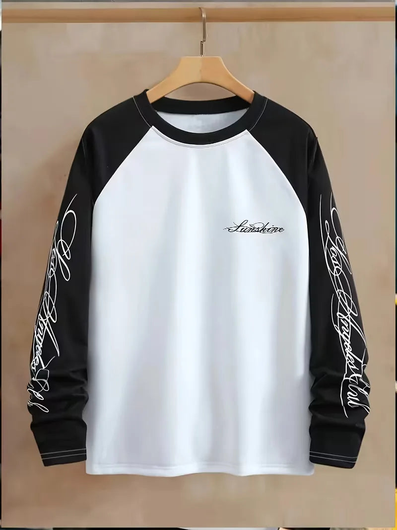 Black and white long sleeve colour block shirt with graphic sleeve prints