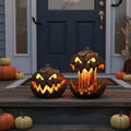 Brown carved Halloween pumpkin lantern with a glowing flame design