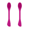 Silicone facial mask brush with an angled head and extended handle