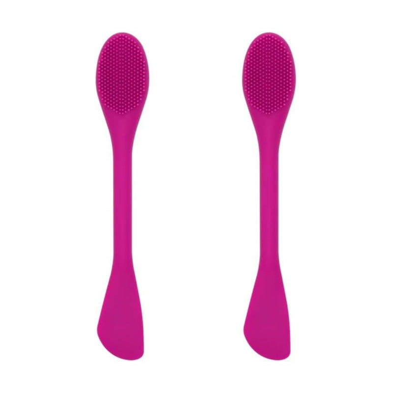 Silicone facial mask brush with an angled head and extended handle