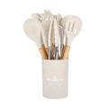 12-piece silicone kitchen utensil set with assorted tools and countertop holder