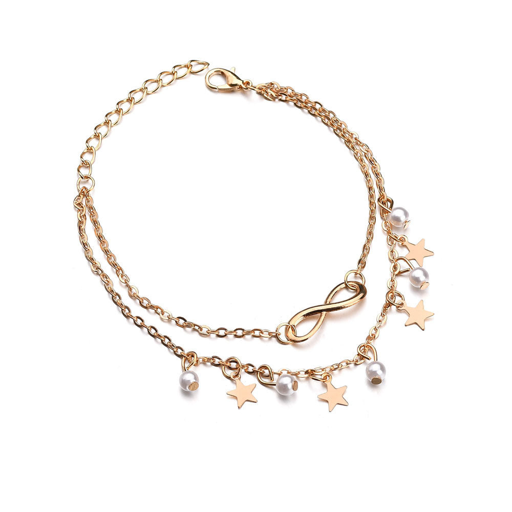 Double-chain pearl charm anklet with star charms and infinity detail