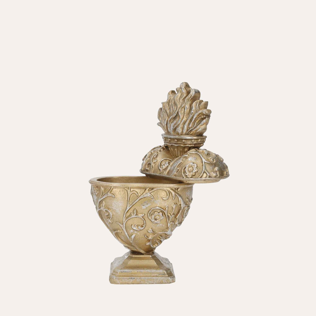 Gold resin Sacred Heart trinket box with ornate detailing and flame-shaped lid