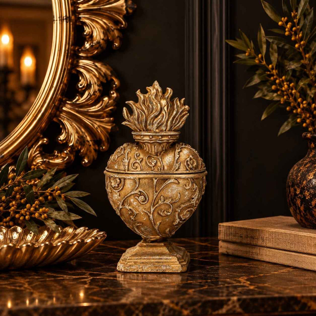 Gold resin Sacred Heart trinket box with ornate detailing and flame-shaped lid
