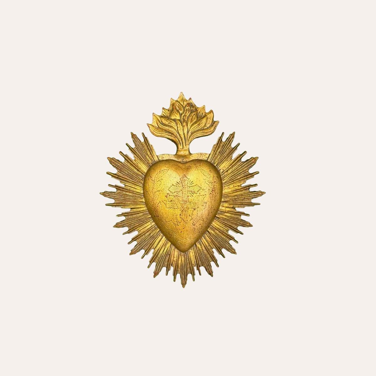 Gold resin Sacred Heart wall decoration with cross motif and radiant rays