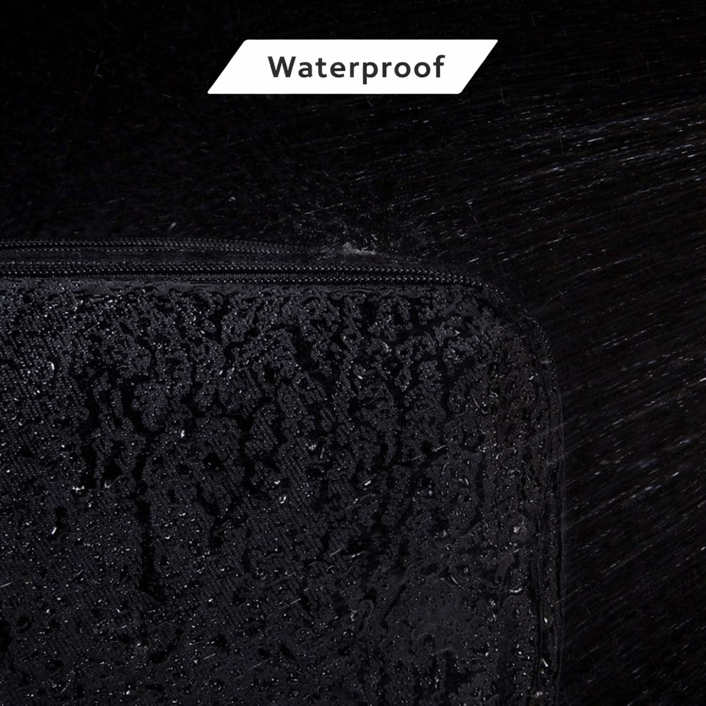 Black toiletry bag with double zippers, mesh pockets and organised interior