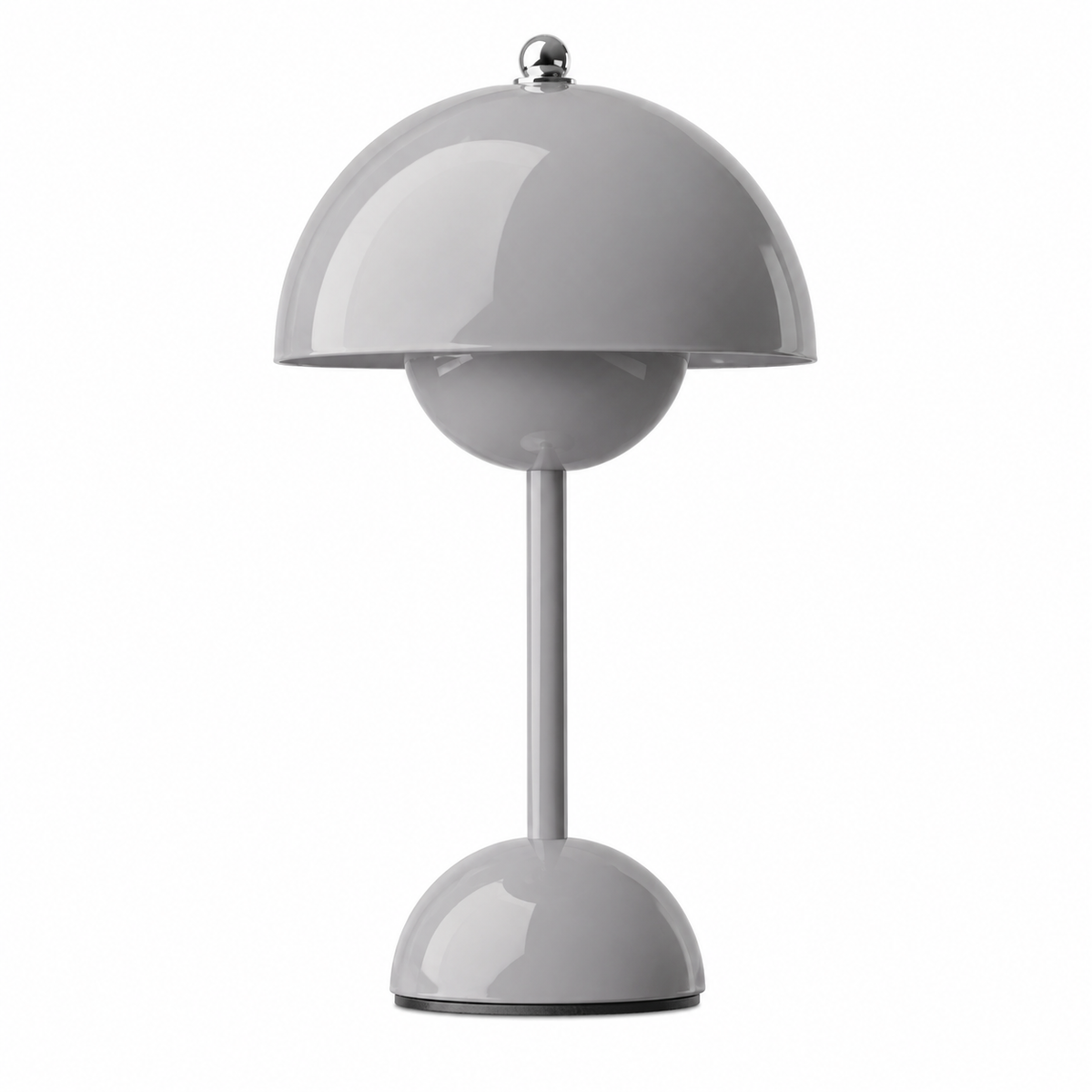 Wireless table lamp with a rounded dome shade and slim central stem