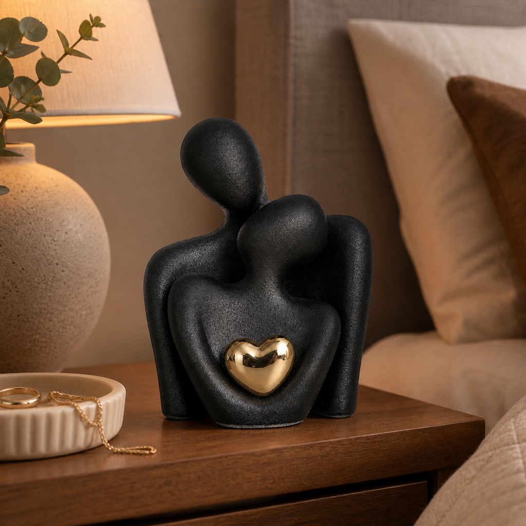 Ceramic couple figurine with a heart detail