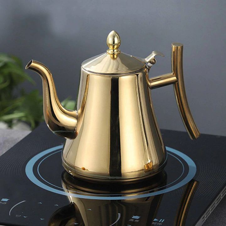 Induction stovetop kettle with curved spout and whistling lid