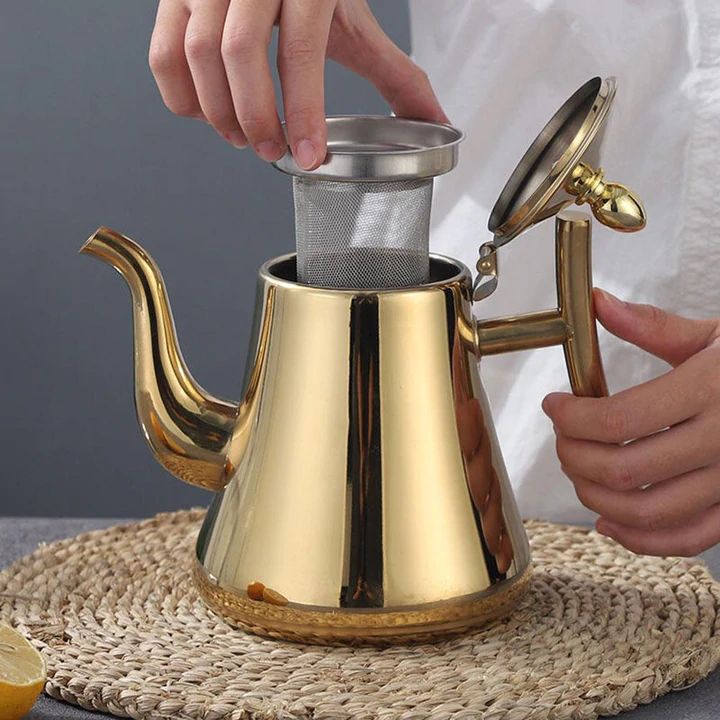 Induction stovetop kettle with curved spout and whistling lid
