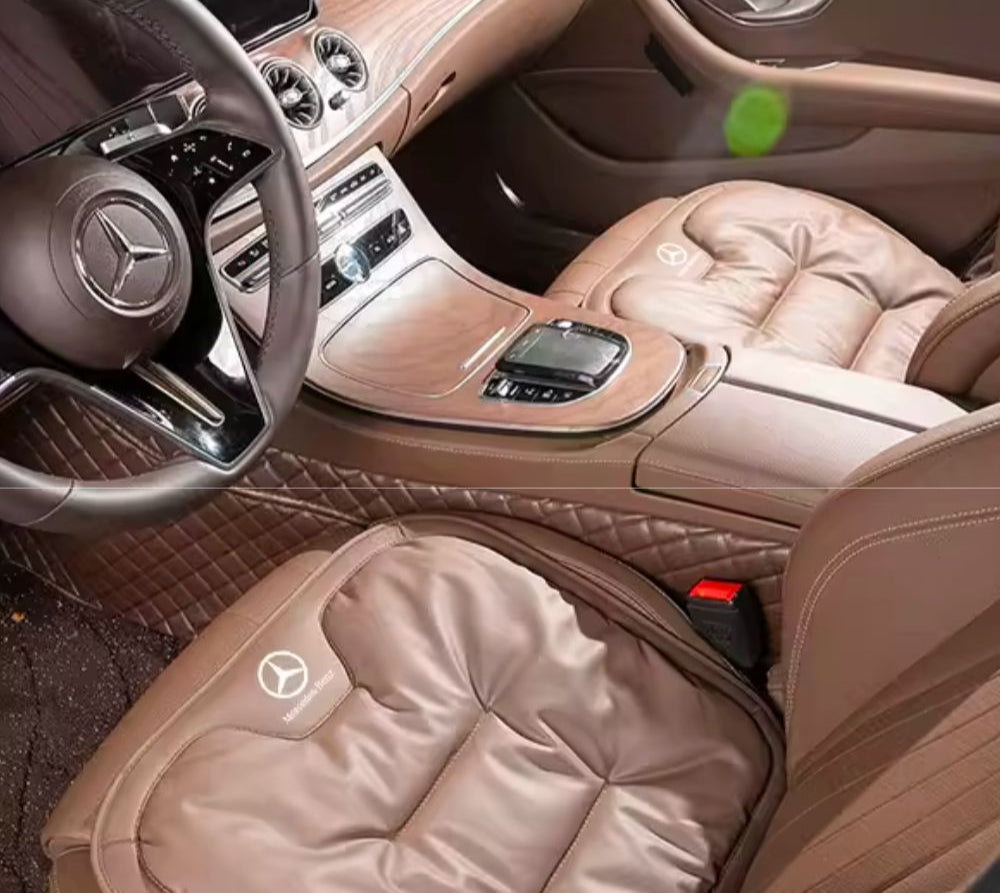 Quilted padded car seat cushion placed on a vehicle seat