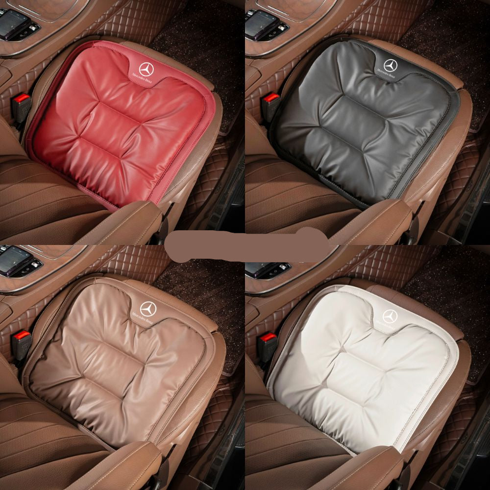 Quilted padded car seat cushion placed on a vehicle seat