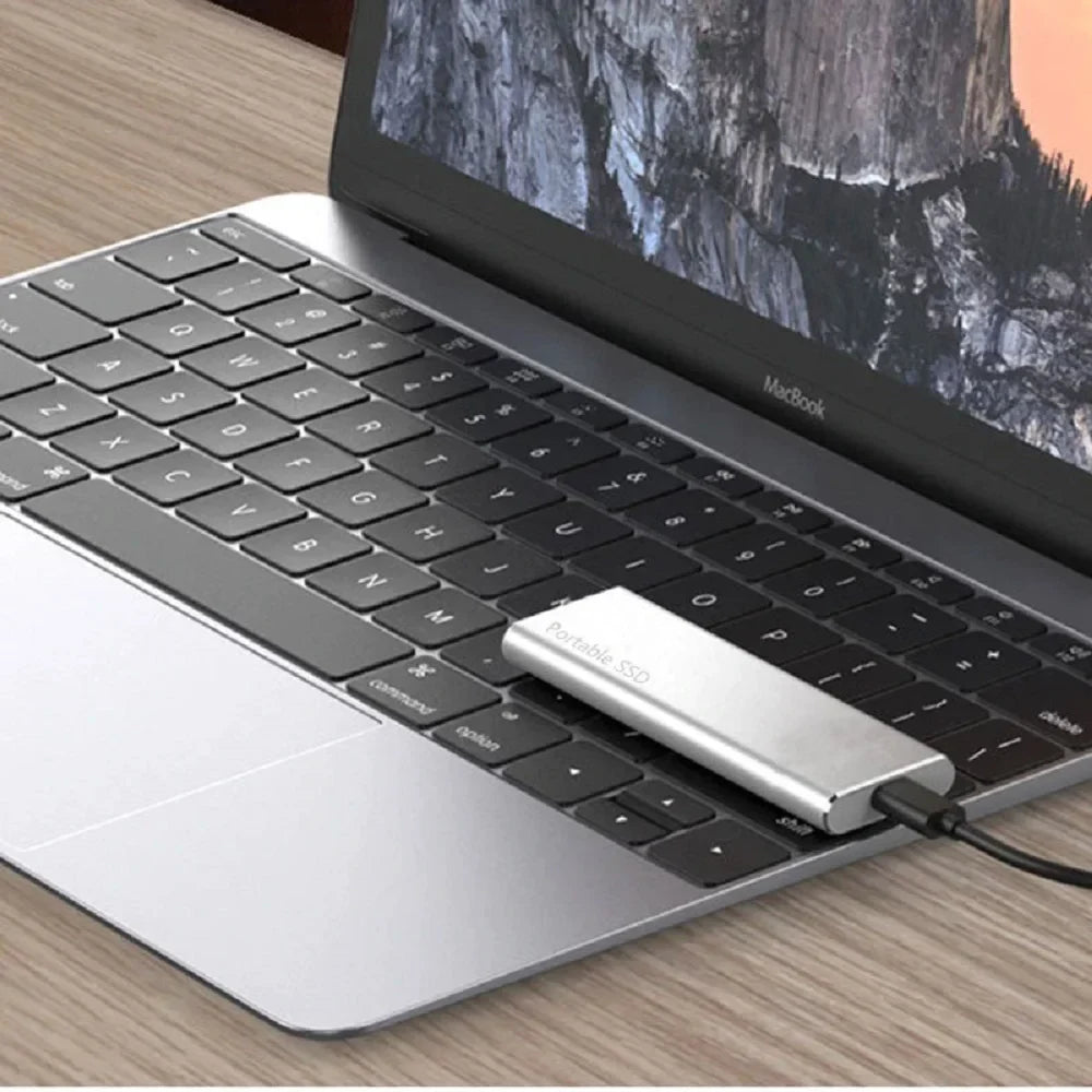 Portable external SSD with USB-C port, cable and connector adapters