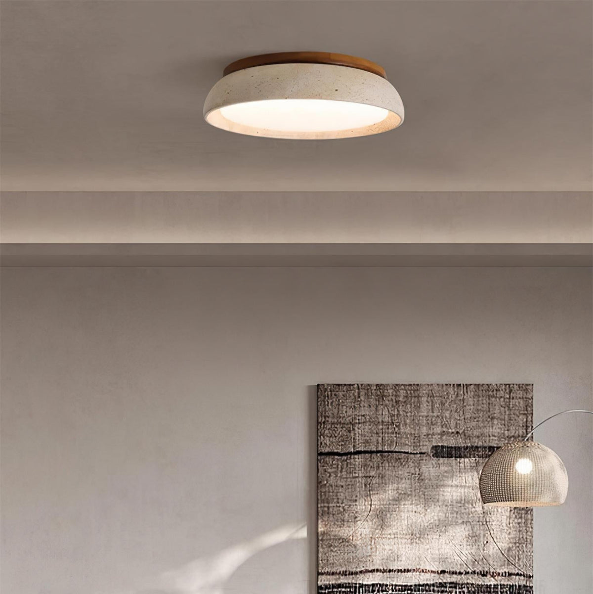 Round flush mount ceiling light with travertine finish and wood-effect trim