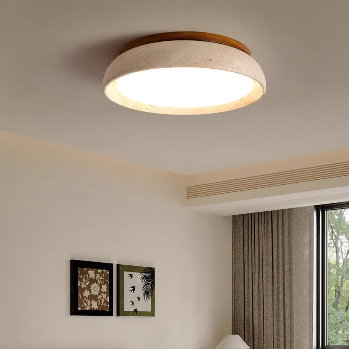 Round flush mount ceiling light with travertine finish and wood-effect trim