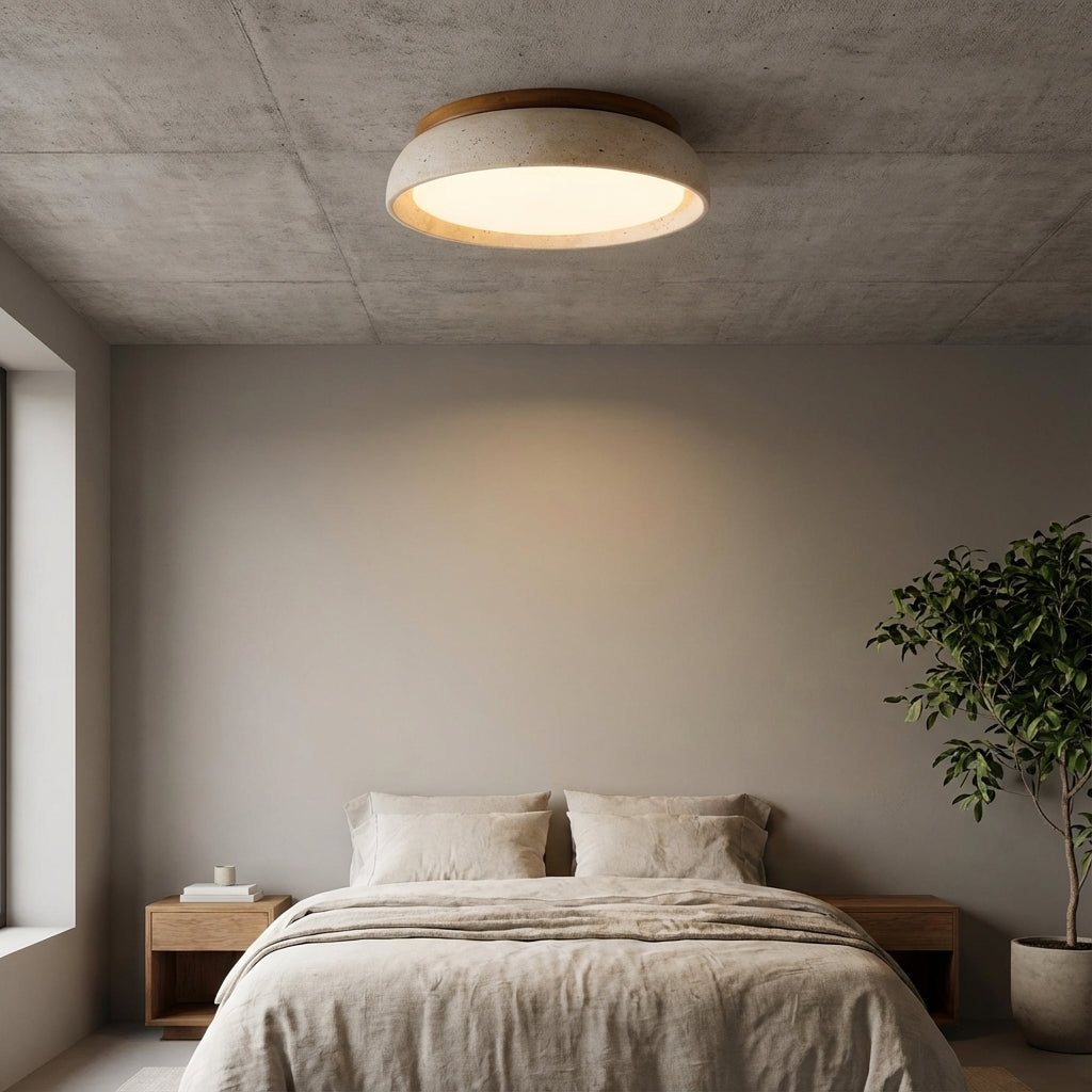 Round flush mount ceiling light with travertine finish and wood-effect trim