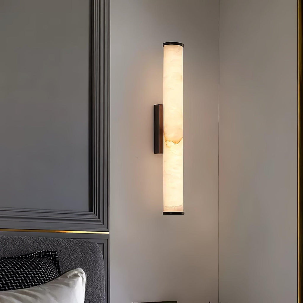 Vertical alabaster column wall sconce with translucent shade and metal trim