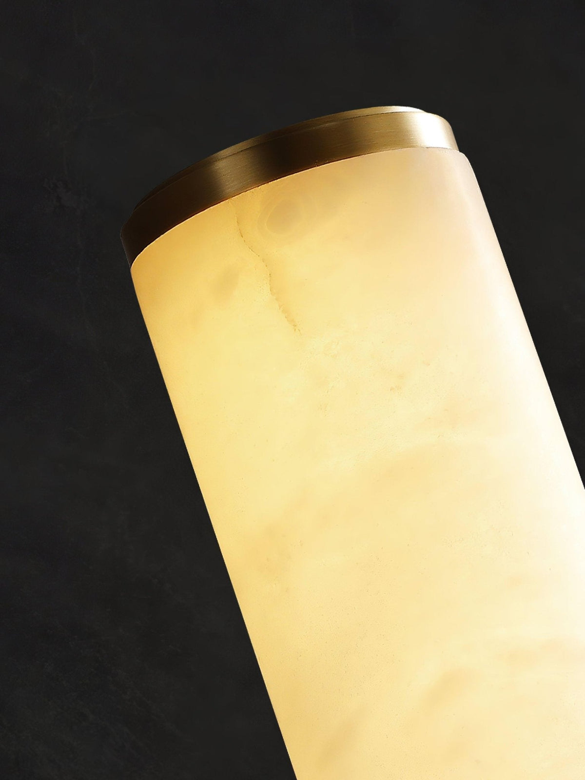Vertical alabaster column wall sconce with translucent shade and metal trim