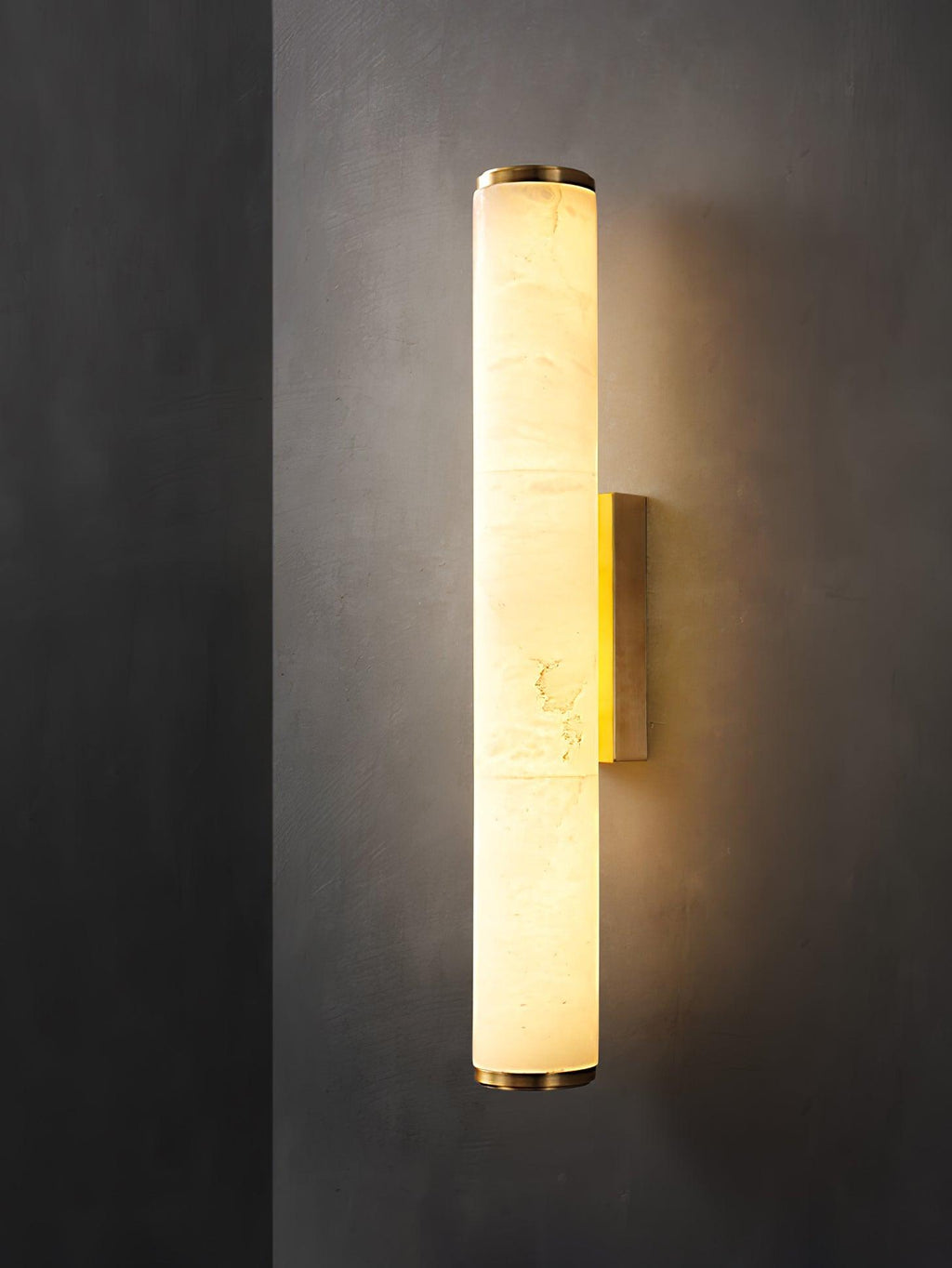 Vertical alabaster column wall sconce with translucent shade and metal trim